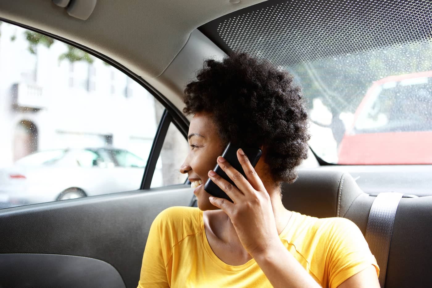 Woman using Gozo Taxi